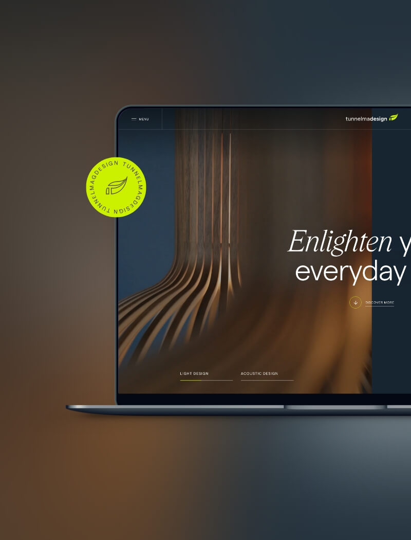 Laptop met de moderne website van TunnelmaDesign: "Verlicht uw dagelijks leven.