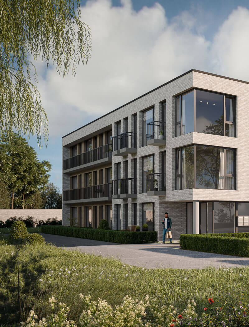 Strak gebouw van 3 verdiepingen met balkons, weelderig groen en een helderblauwe lucht.